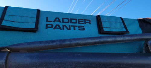 Ladder Pants logo close up on product